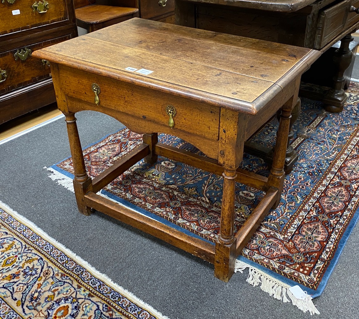 An early 18th century oak side table, width 76cm, depth 50cm, height 65cm